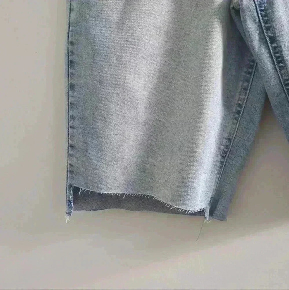 CALVIN KLEIN | Women's Light Wash High Rise Ripped Hem Shorts - Picture 2 of 5